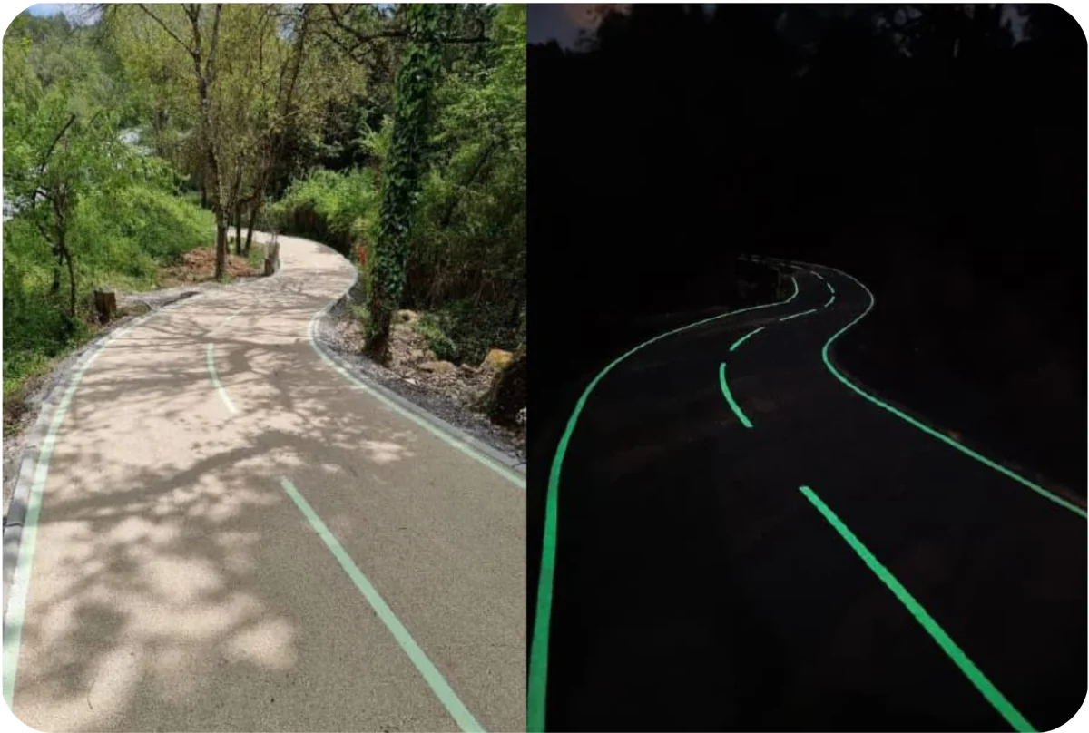 The same road by day and by night, its markings glowing after dark
